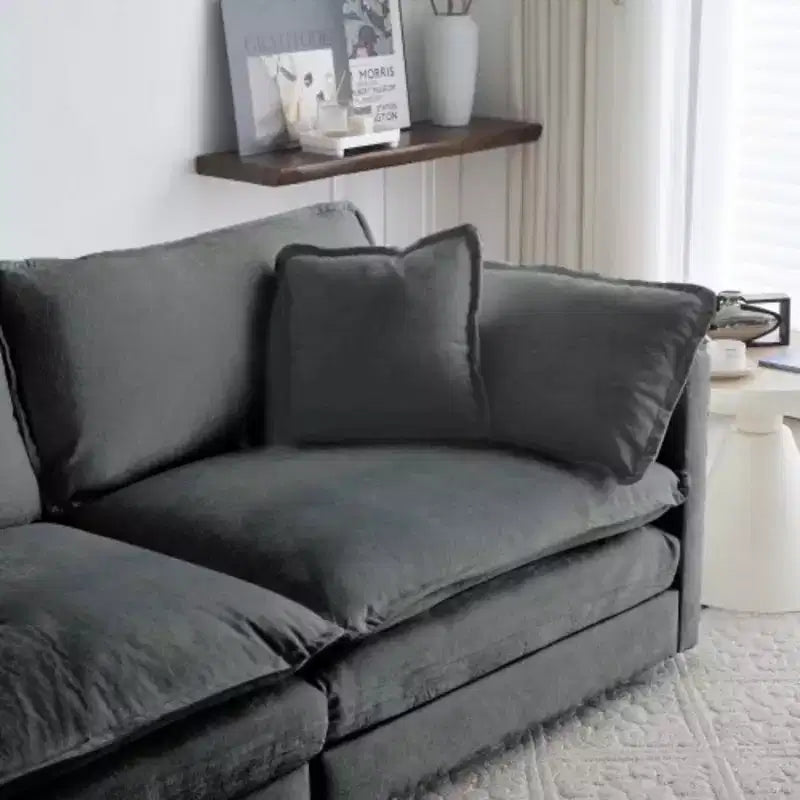 Divano a U modulare: chaise longue reversibile, doppi pouf e comfort eccezionale