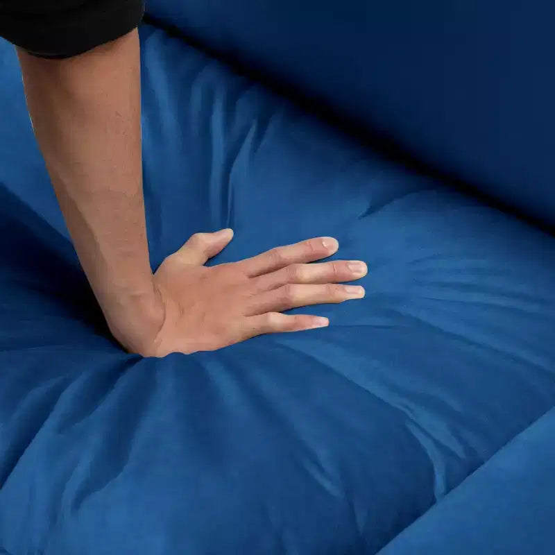 117.7 Divano componibile con pouf grigio scuro, in velluto.