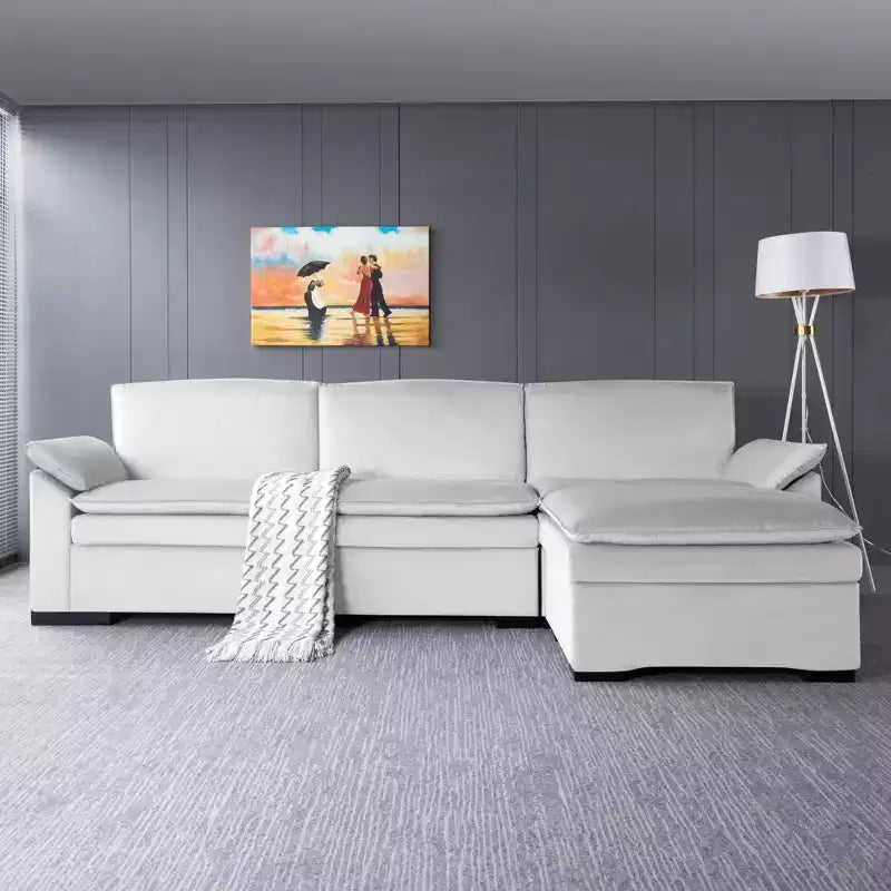 117.7 Divano componibile con pouf grigio scuro, in velluto.
