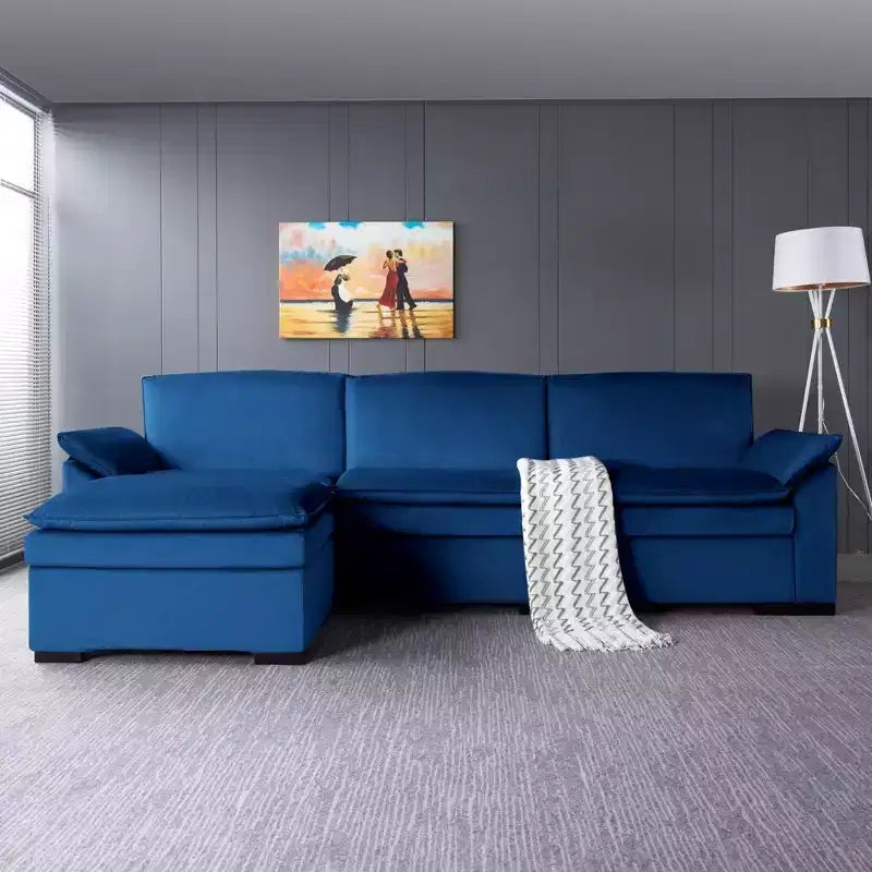 117.7 Divano componibile con pouf grigio scuro, in velluto.