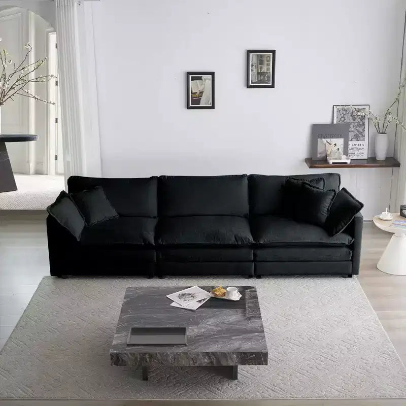 Comodo divano componibile oversize a L con ottomana reversibile in ciniglia beige