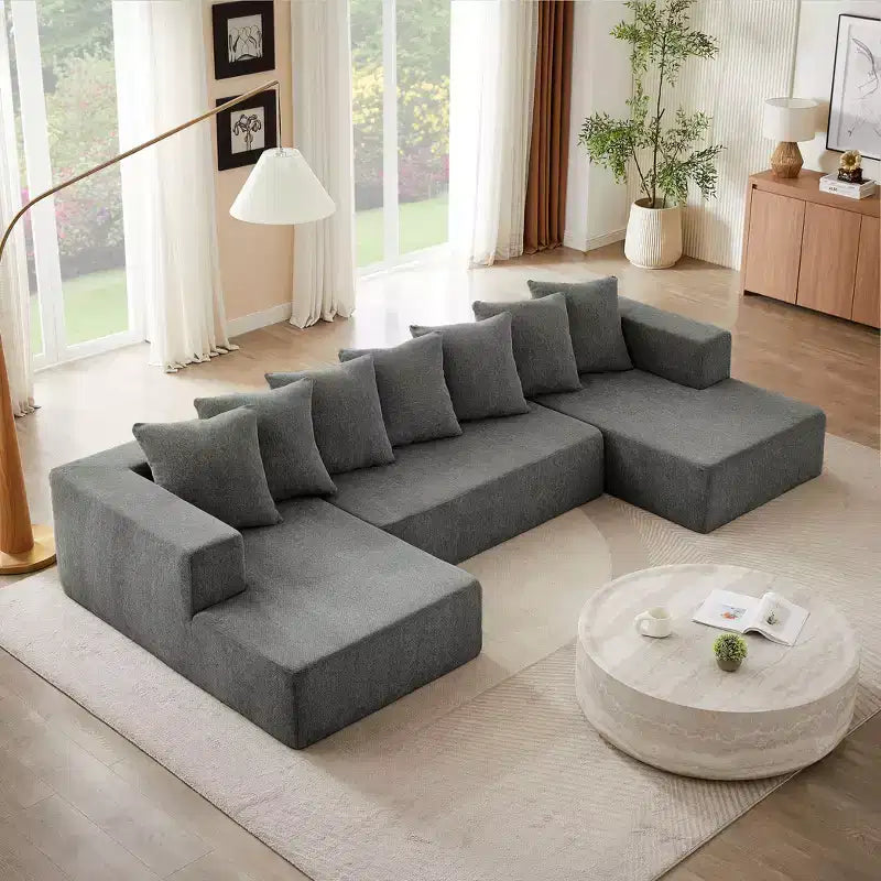 Divano Sezionale in ciniglia con seduta imbottita e cuscini fissi per un uso versatile in soggiorno, camera da letto e ufficio