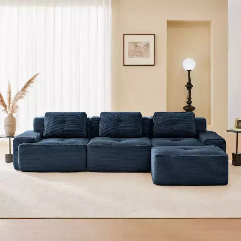Divano componibile moderno a L 117 per soggiorno, in tessuto a coste, divano a 3 posti con seduta profonda e pouf mobile, color cammello
