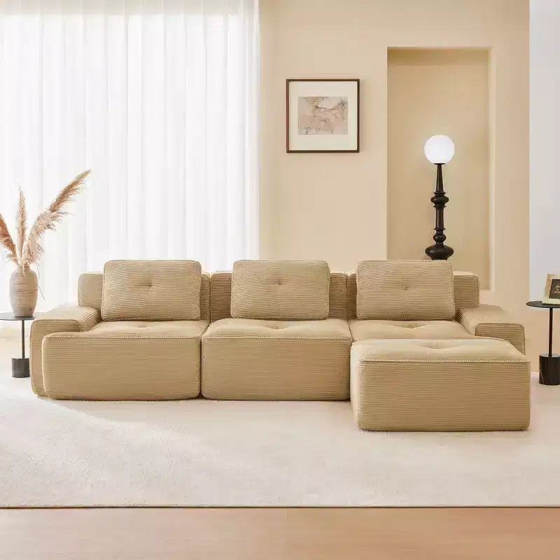 Divano componibile moderno a L 117 per soggiorno, in tessuto a coste, divano a 3 posti con seduta profonda e pouf mobile, color cammello